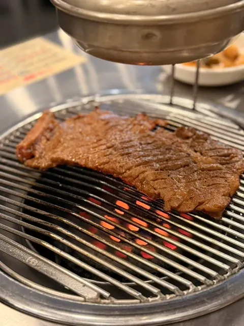 Pre-grilled marinated ribs on the grill