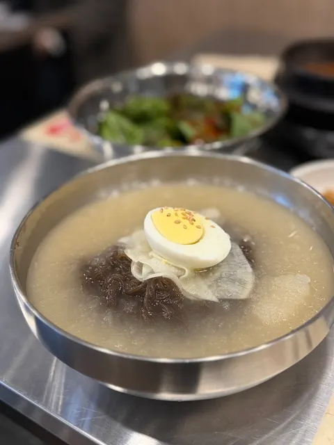 Mul-naengmyeon ordered alongside the meat