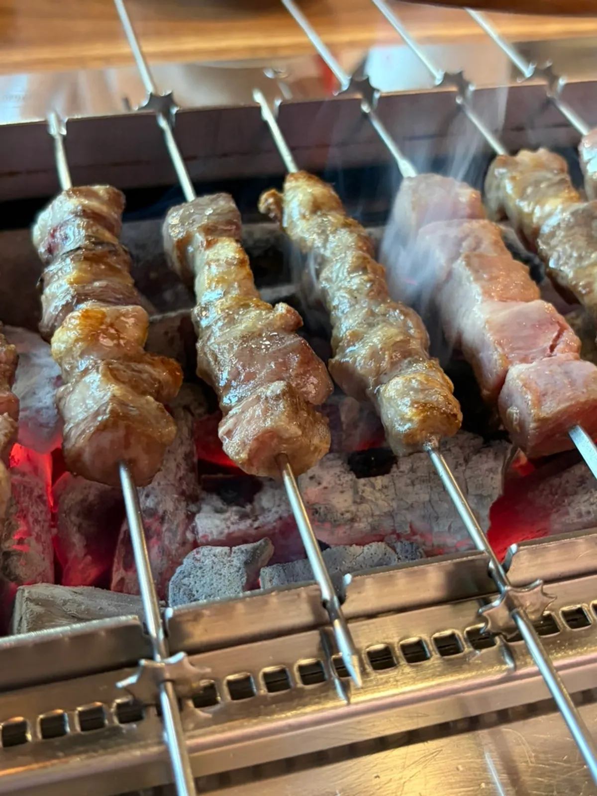 Golden-brown lamb skewers and lamb rib meat skewers