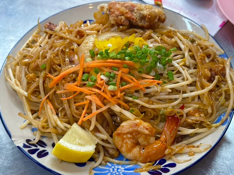 Thai food with Chang beer and cola