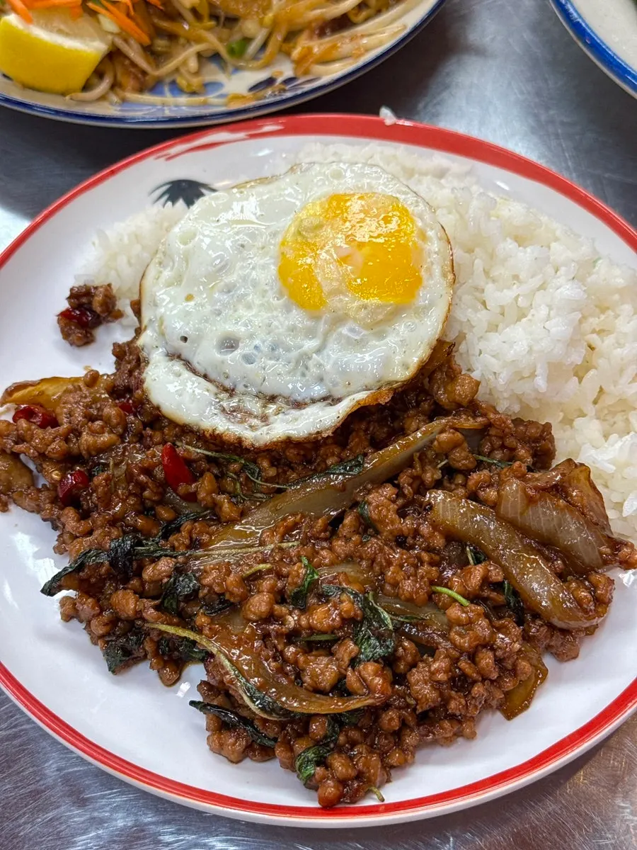Pad kra pao moo sap with a fried egg
