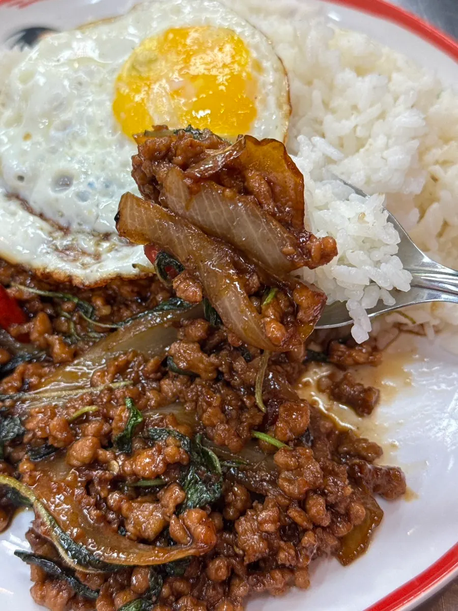 Pad kra pao moo sap served with rice