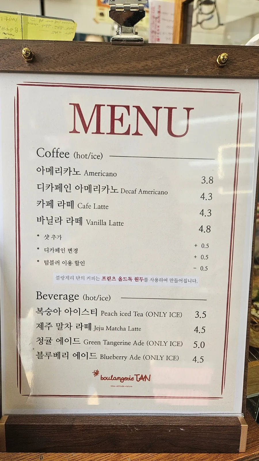 Display of bakery items and sandwich menu