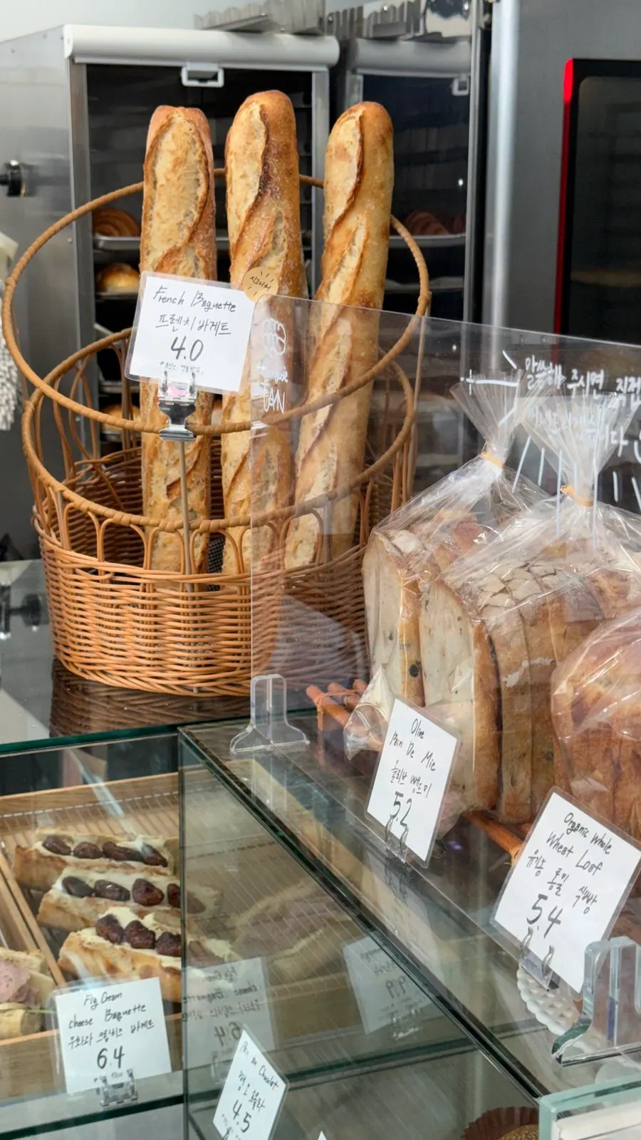 Breads displayed in the Boulangerie Tan showcase