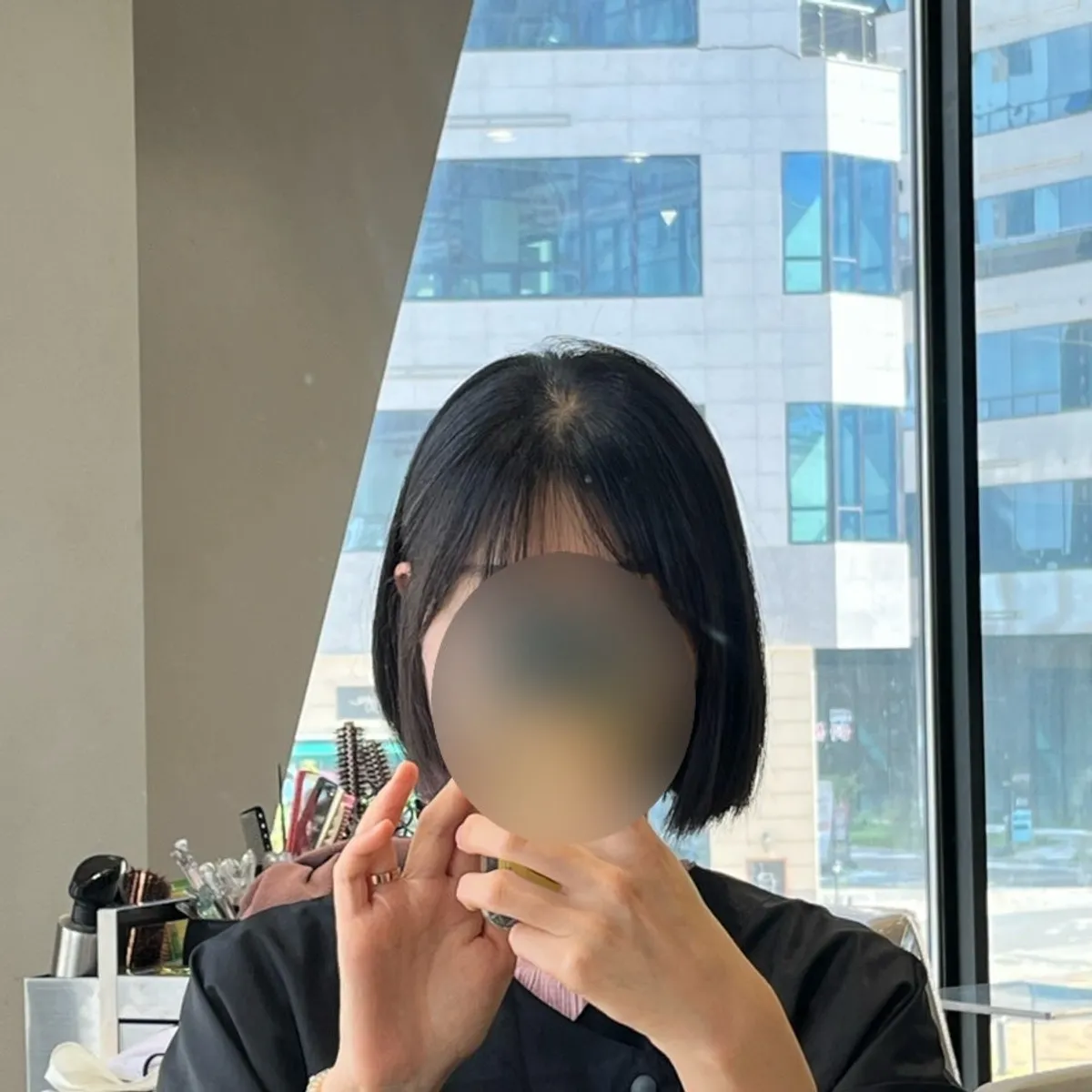 Short bob style after volume straightening