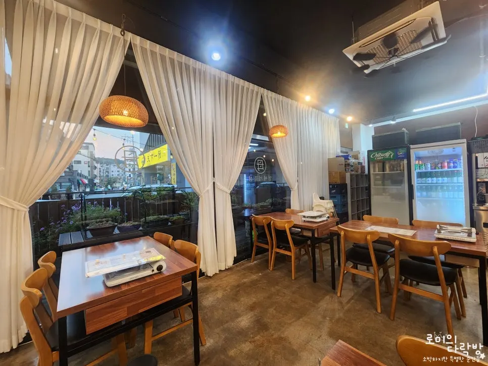 Dining hall with wooden tables and chairs