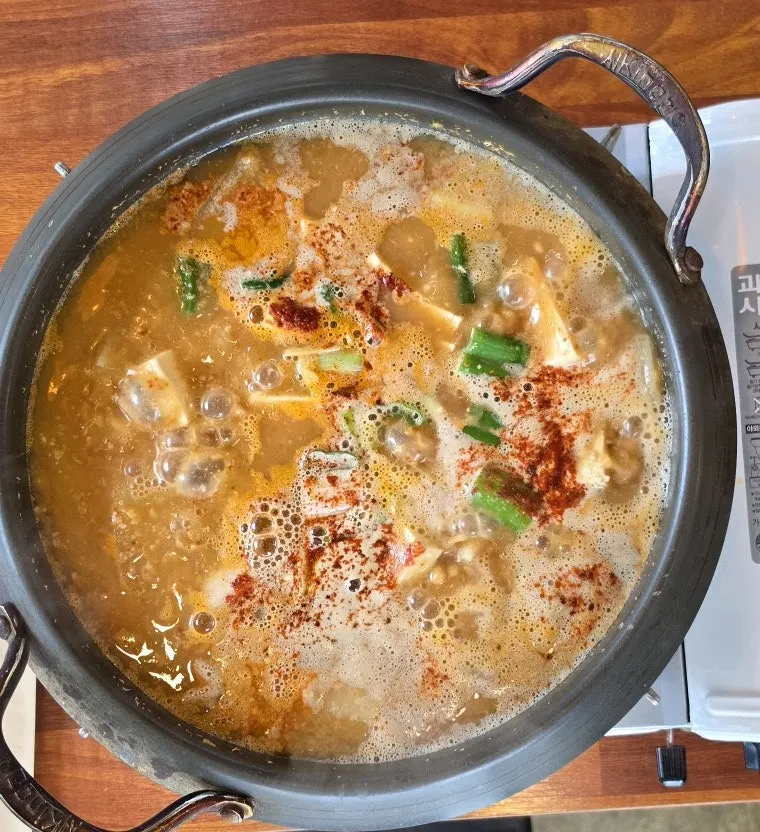 Cheonggukjang stone pot served with the ttuksim rice set