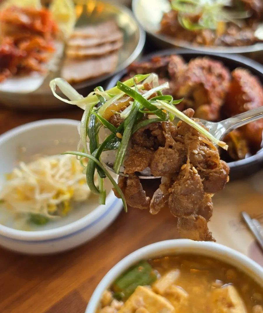 Side dishes and yeolmu kimchi at Eomma-ui Ttuksim