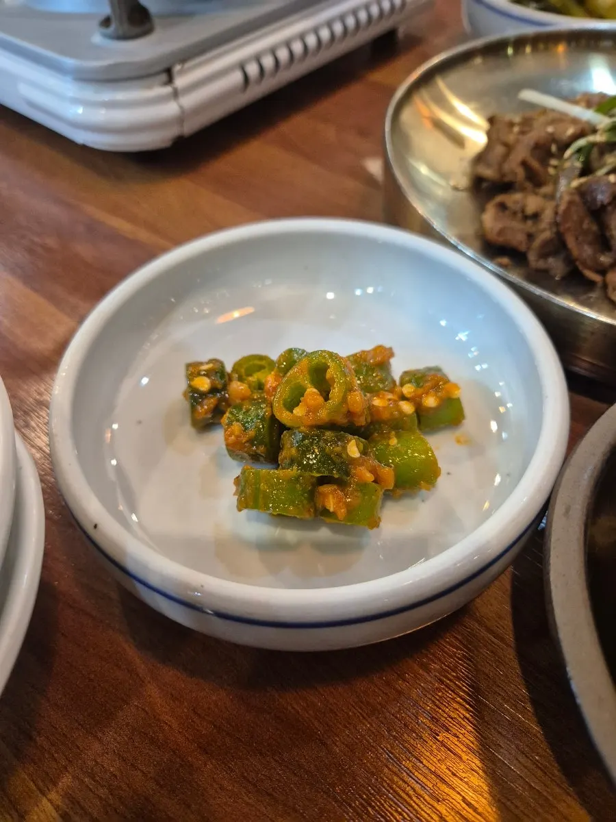 Plates of banchan from the table-setting meal at Eomma-ui Ttuksim