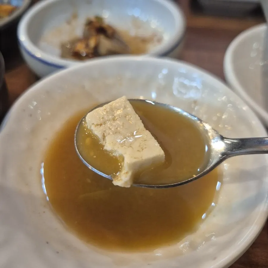 Doenjang jjigae served in a large pot at Eomma-ui Ttuksim