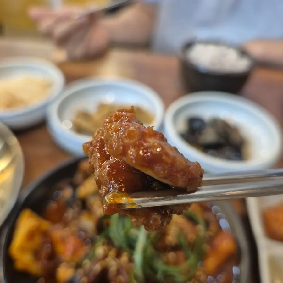 A bite of stir-fried octopus paired with rice