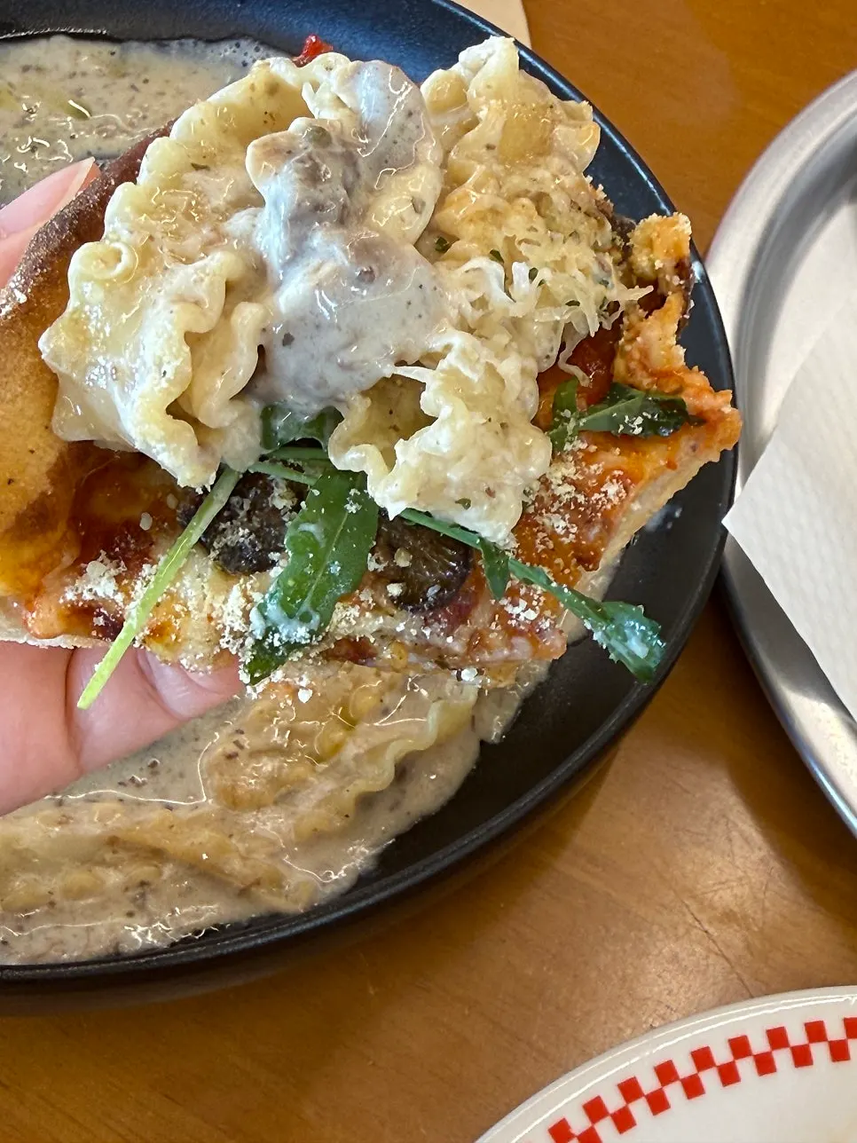 Pasta placed on top of pizza