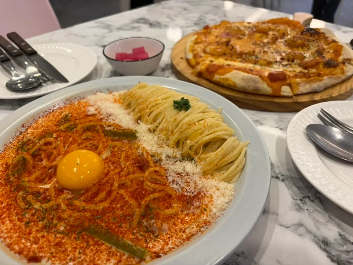 Full spread of Palette Pasta and Shrimp Rosé Pizza
