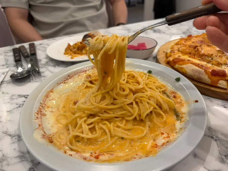 Palette Pasta with the egg yolk broken and mixed in