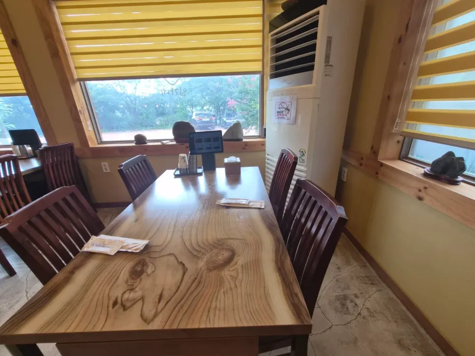 Dining hall seating with a baby chair visible