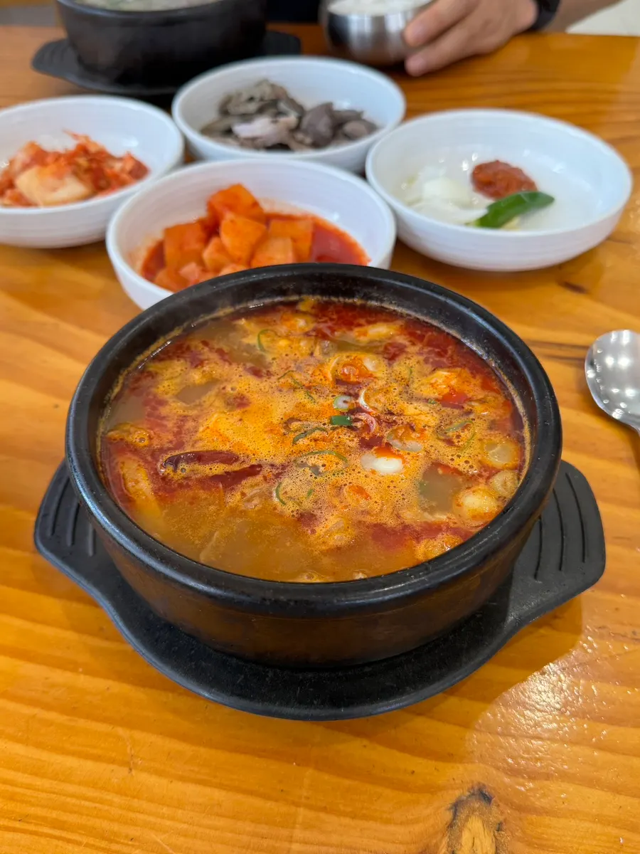 Table condiments: chili paste, ground perilla seeds, and salted shrimp