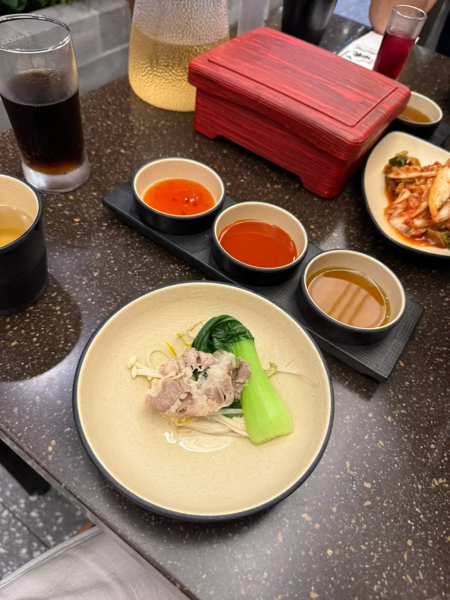 Three sauces — chili sauce, vinegared gochujang, and soy sauce