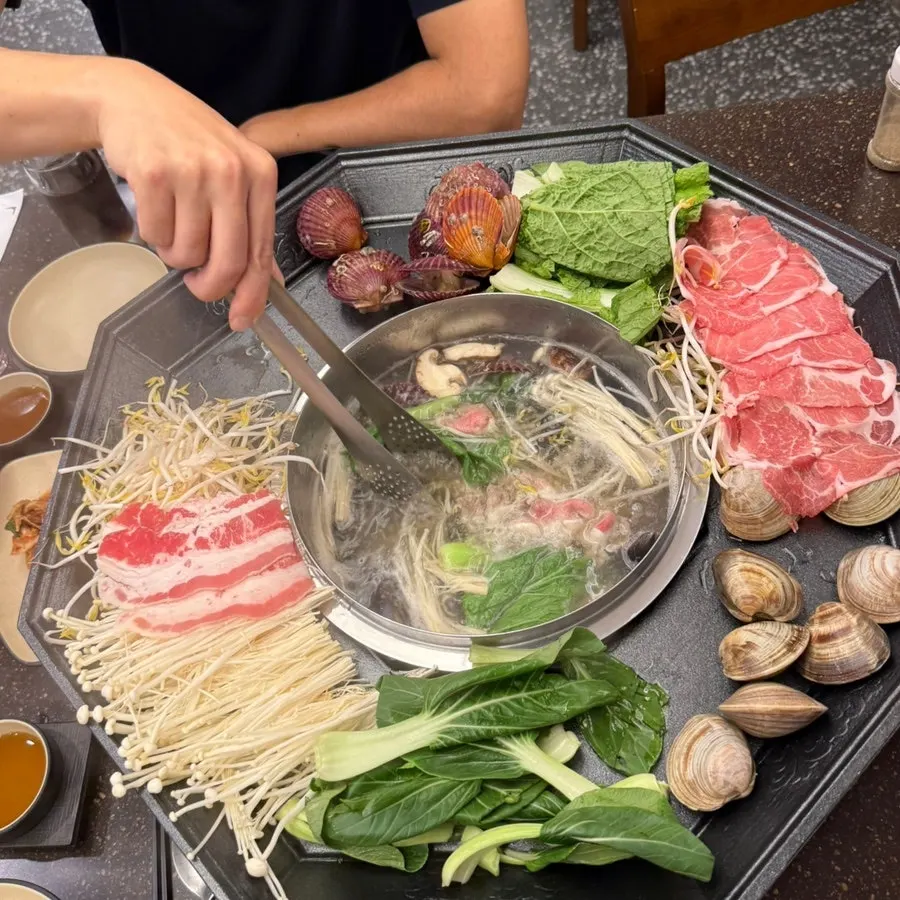 A plate with two cuts of beef — chuck and beef belly