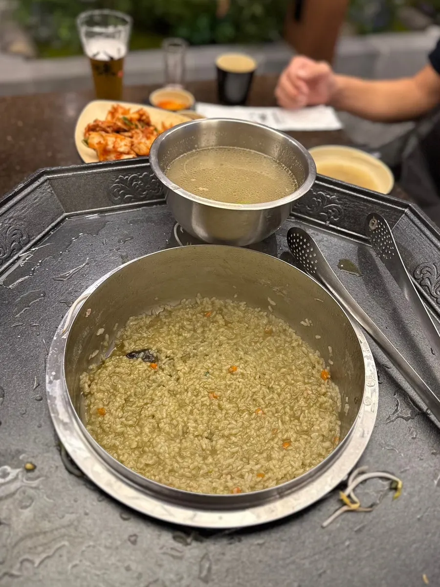 A finished bowl of abalone geou porridge