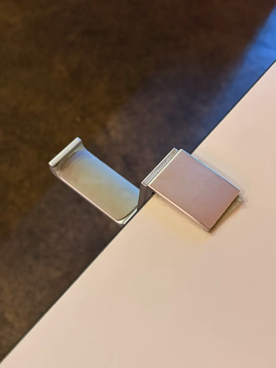 Bag hook attached to a table at Panna