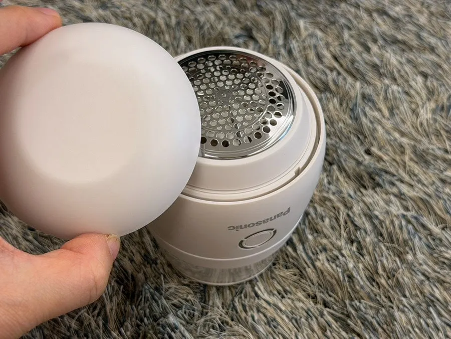 White design of the Panasonic cordless fabric shaver