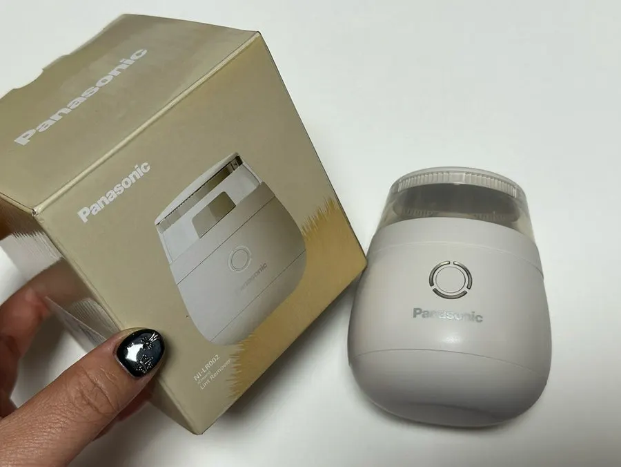 Panasonic cordless lint removers in purple and cream
