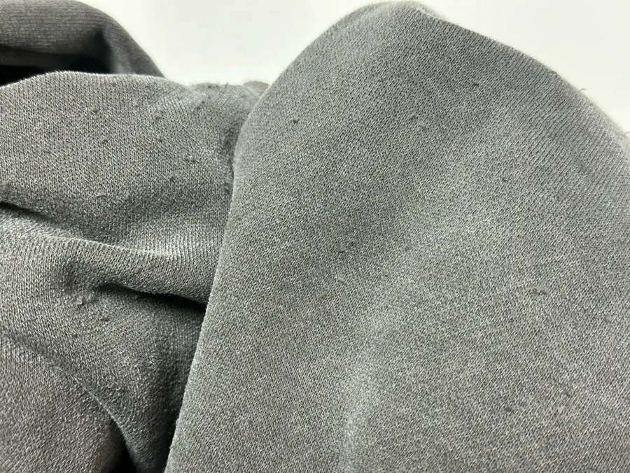 Removing lint from clothing with a cordless lint remover