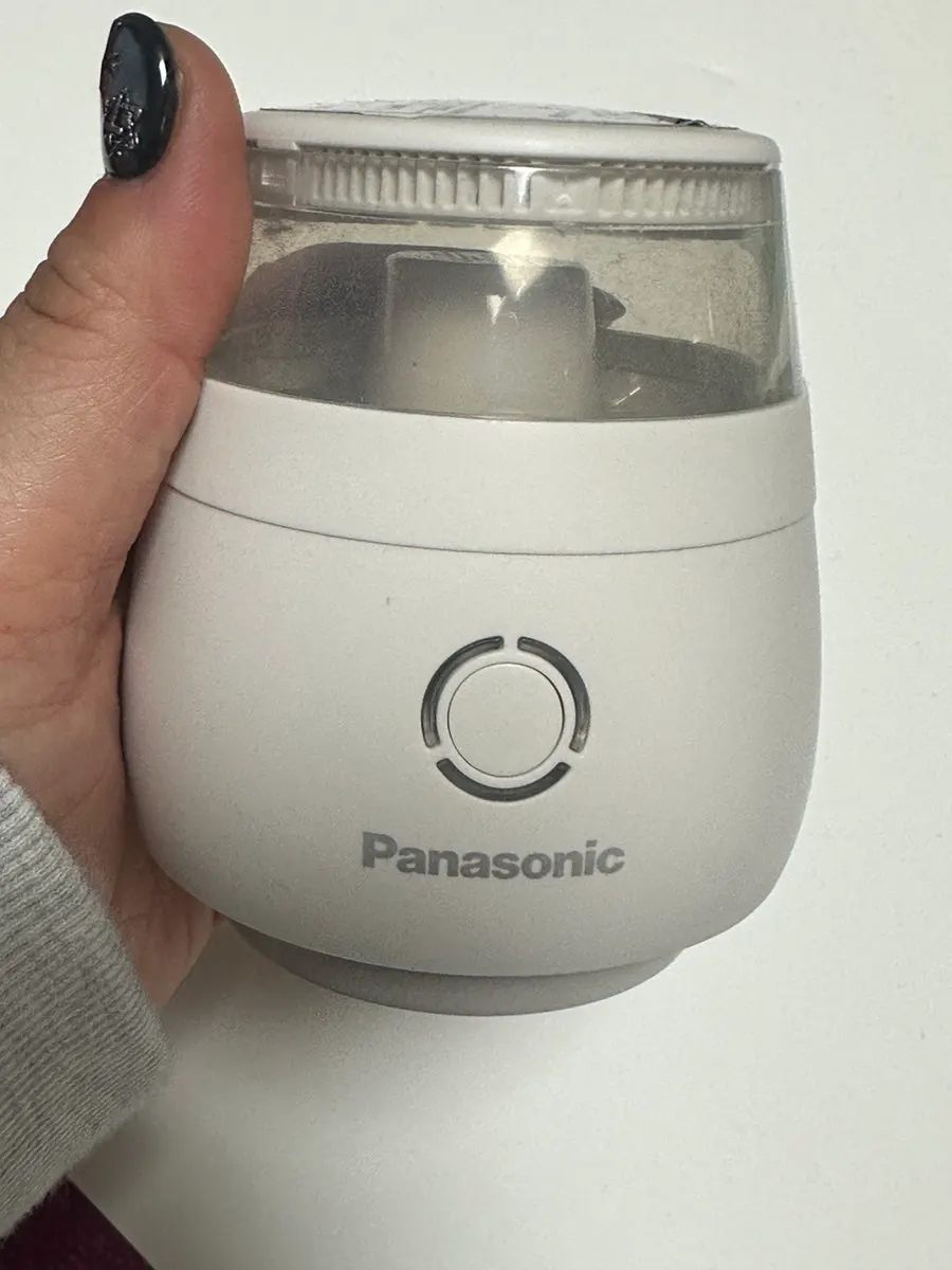 Clothing and lint remover examined while removing lint
