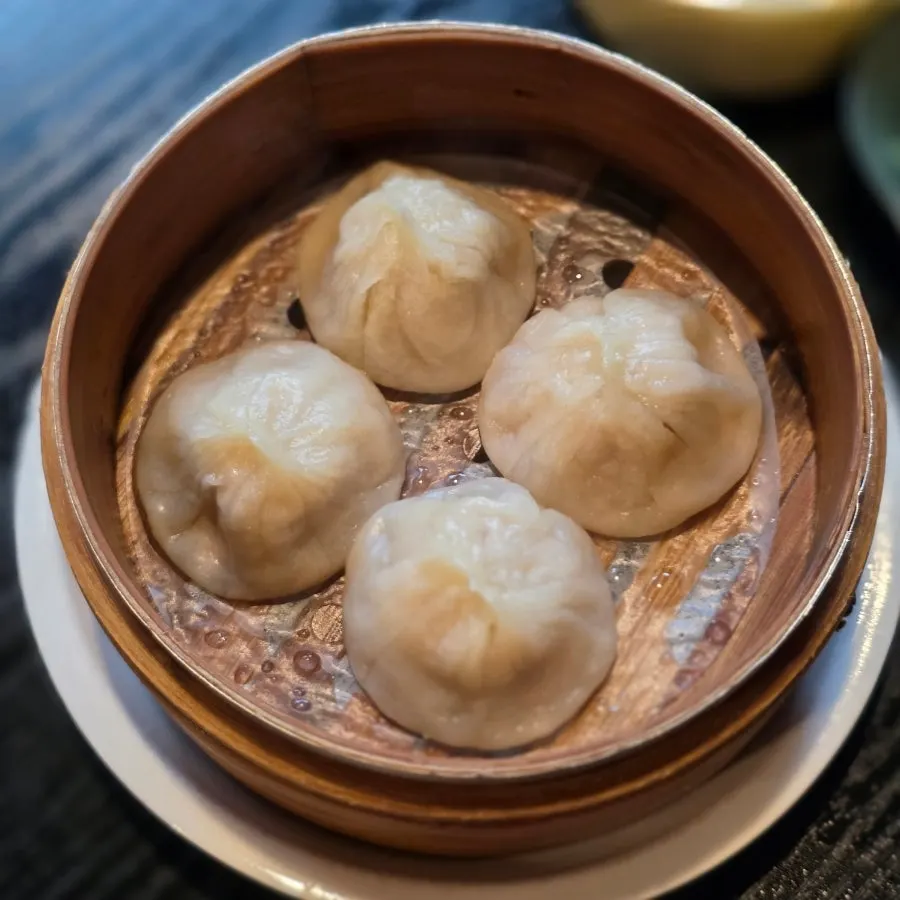 Food laid out on a table at Panda Dim Sum
