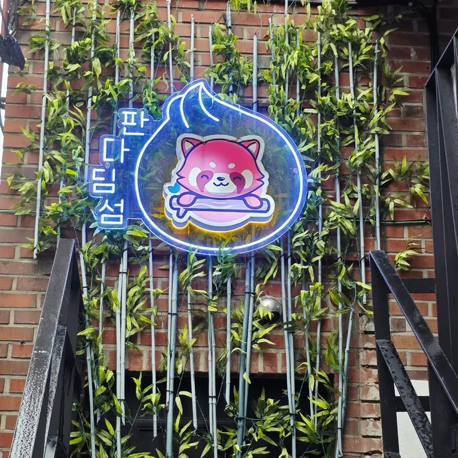 Entrance to Panda Dim Sum on the second floor with panda props
