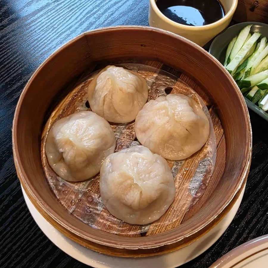 Xiaolongbao in a steamer basket at Panda Dim Sum