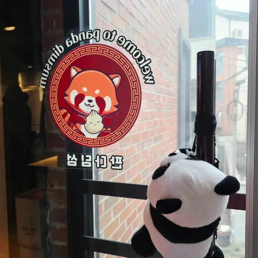 A table with Peking duck, dim sum, and yurinji all together