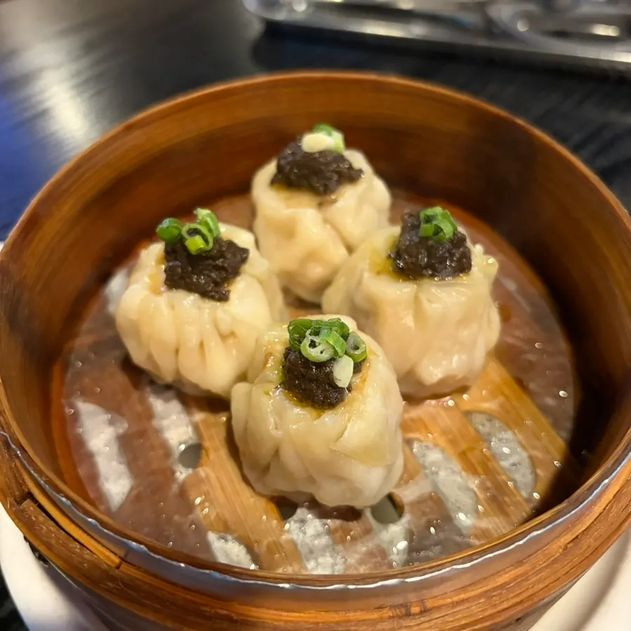 Close-up of truffle-topped shumai