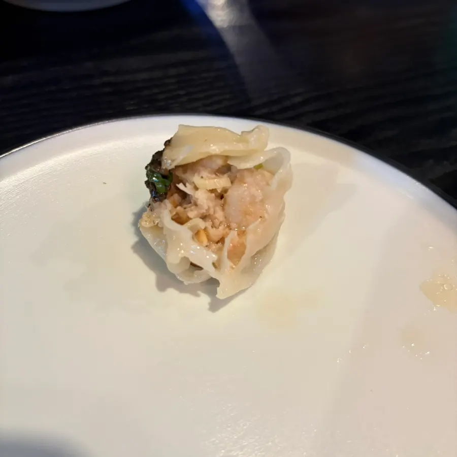 Cross-section of a bitten truffle shumai