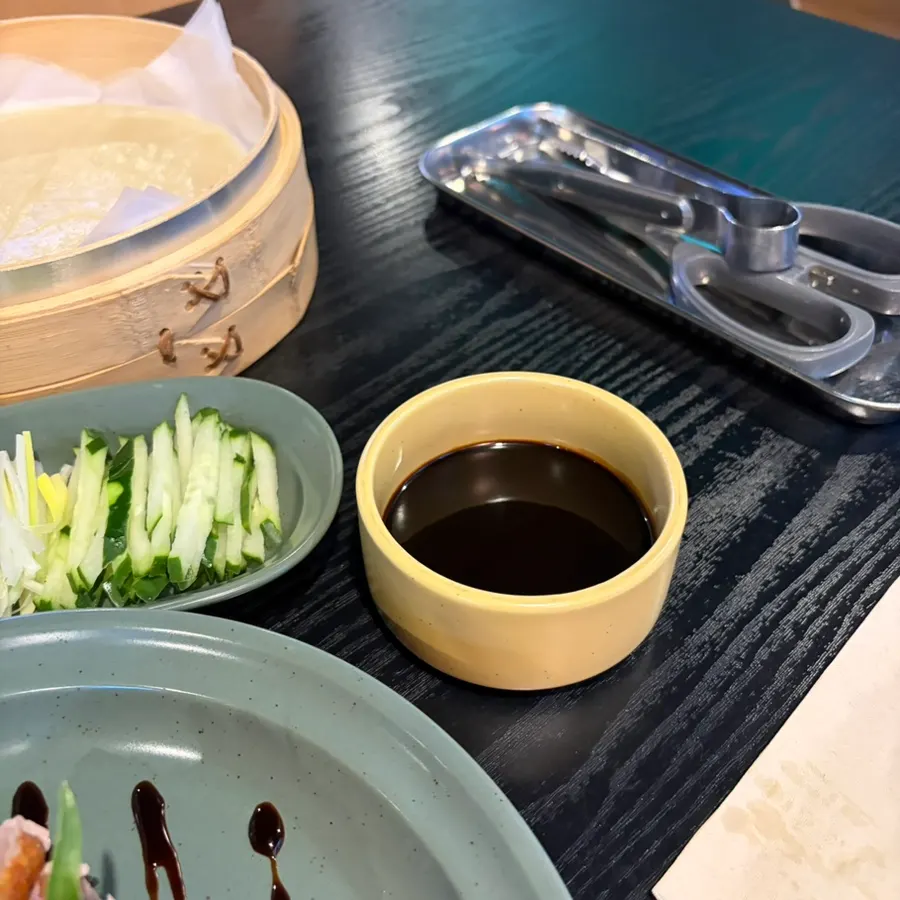 Plate of Peking duck skin and sugar