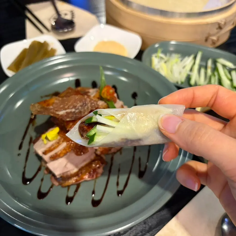 Peking duck wrapped in a pancake