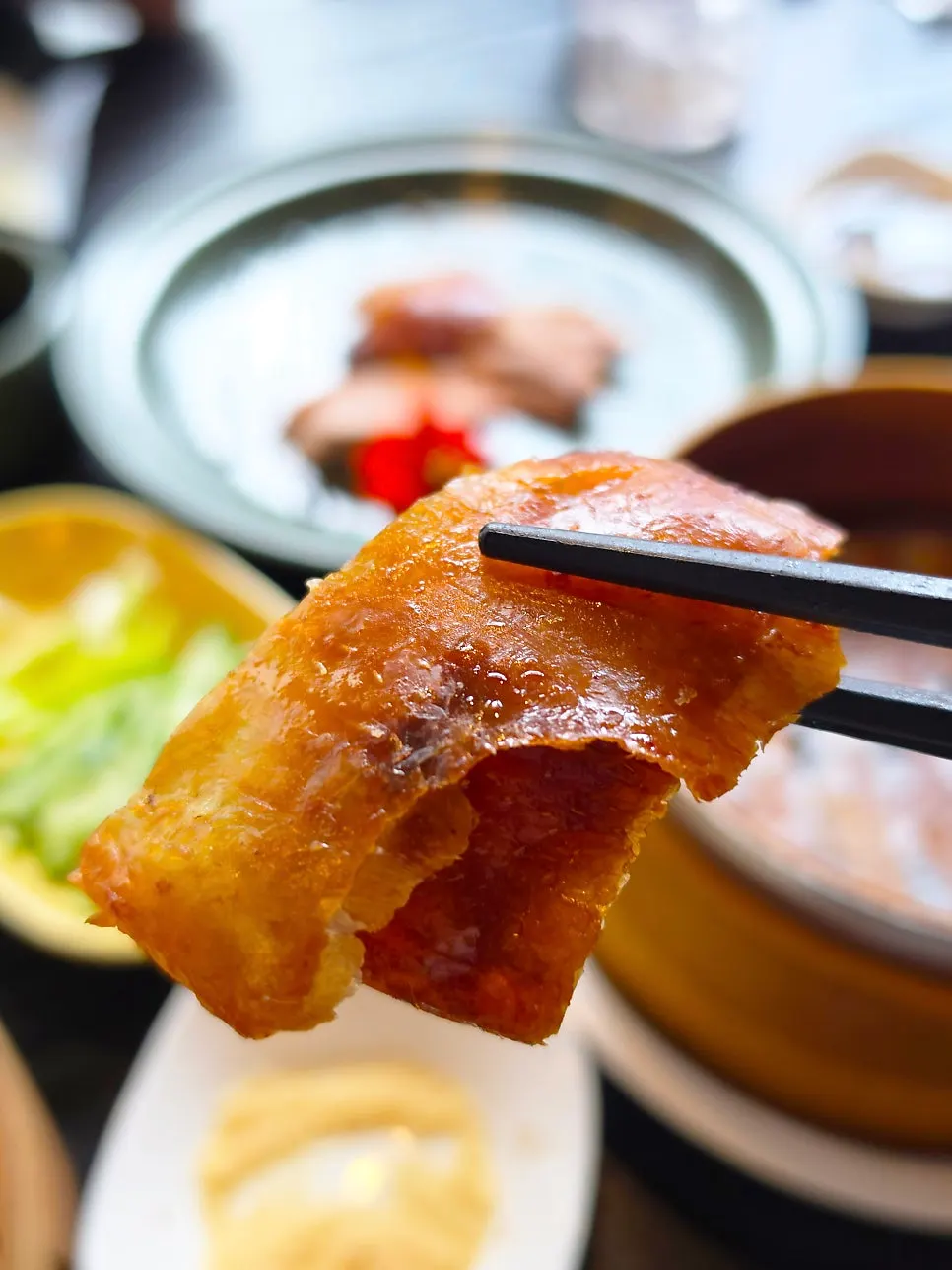 Peking duck skin cut into bite-sized pieces