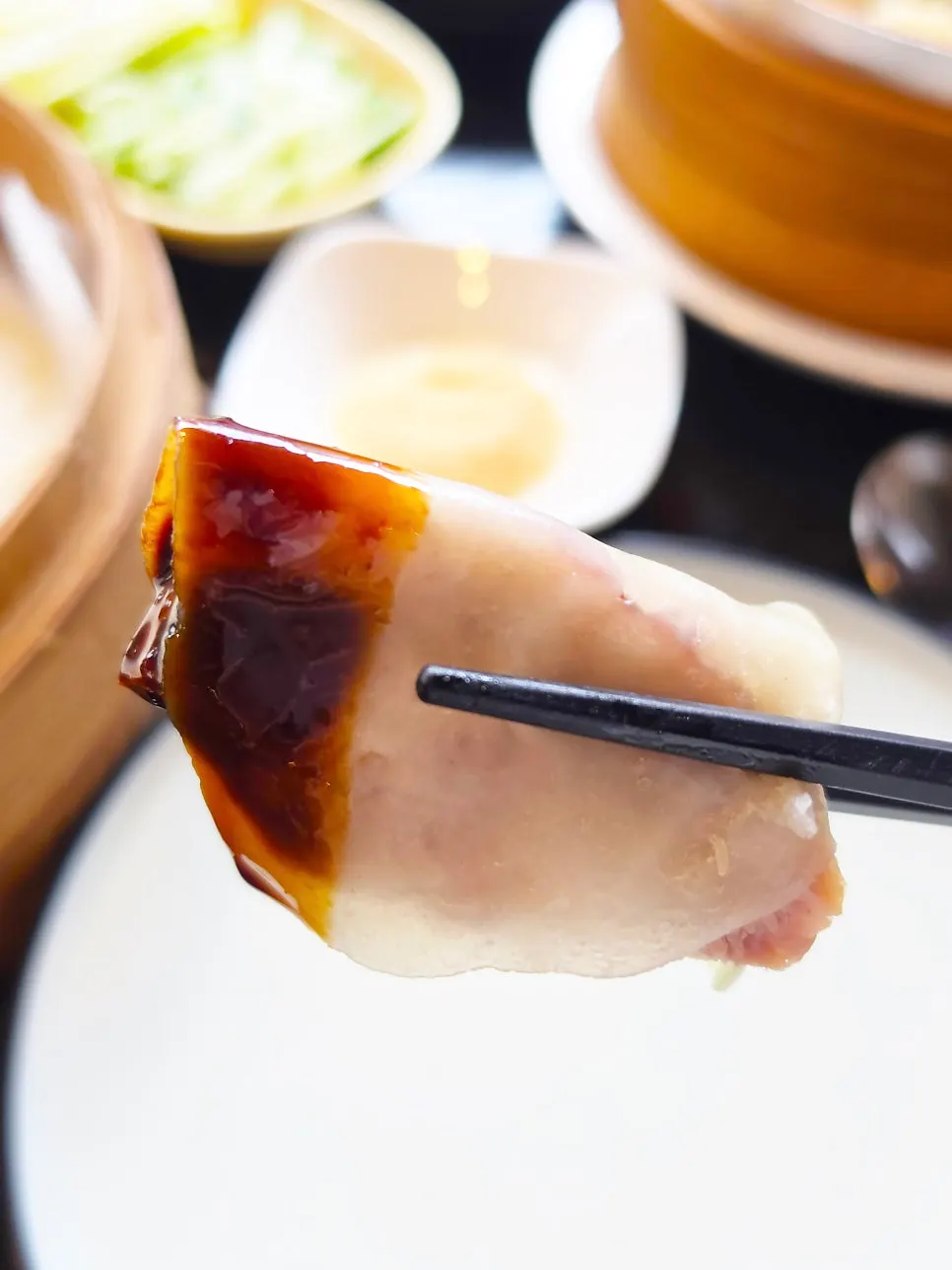 Peking duck wrapped in a pancake with sauce