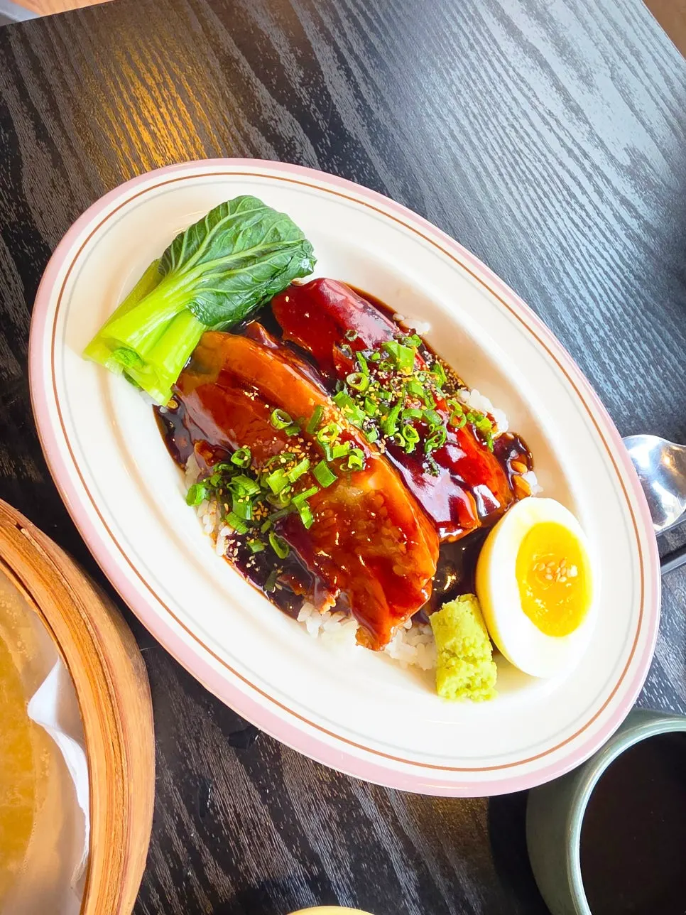 A bowl of Panda Dim Sum's dongpo pork rice bowl