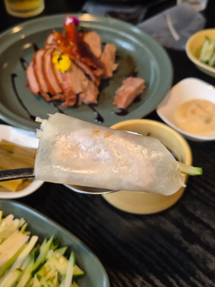 Finished Peking duck wrap in a wheat pancake