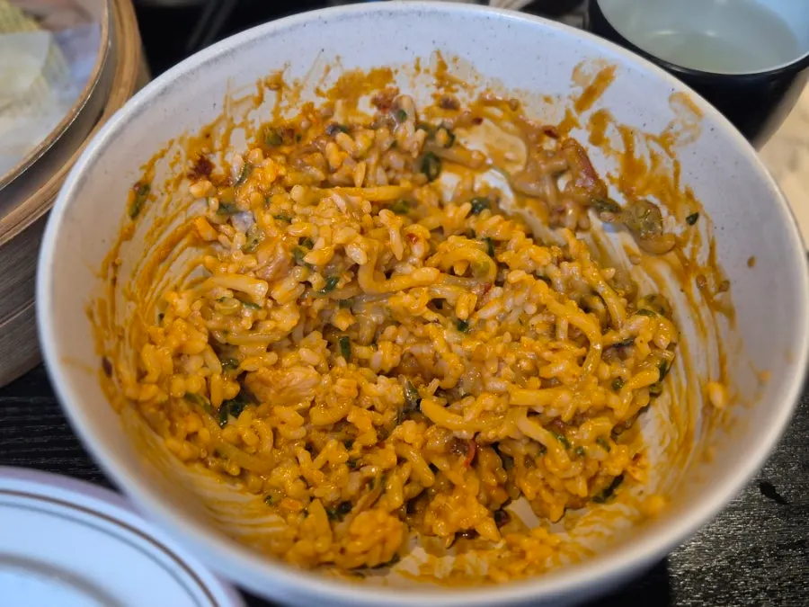 Rice mixed into the leftover chicken dan dan noodle sauce