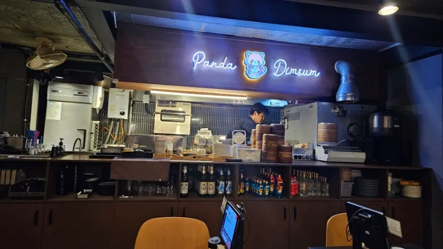 Interior of Panda Dim Sum with panda-themed decor items