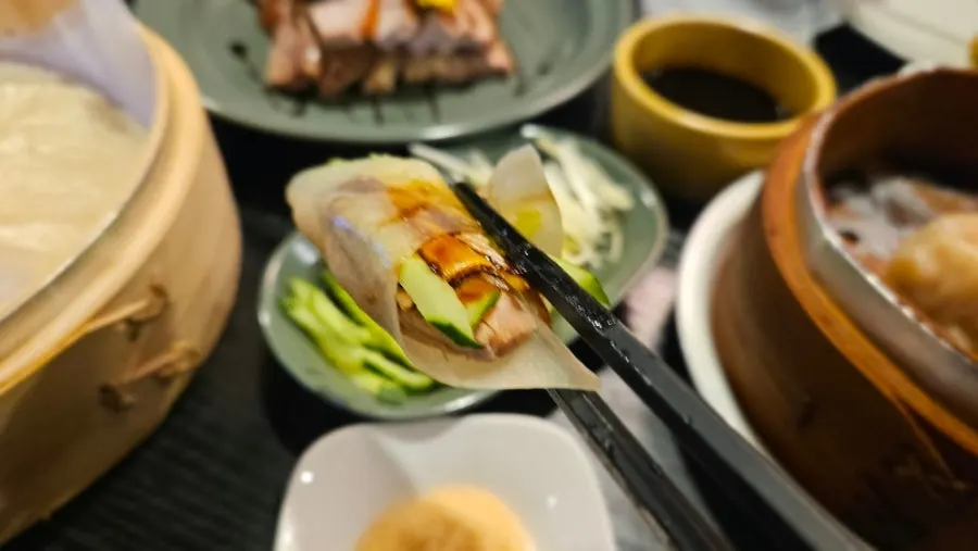 Peking duck spread laid out for making your own wraps