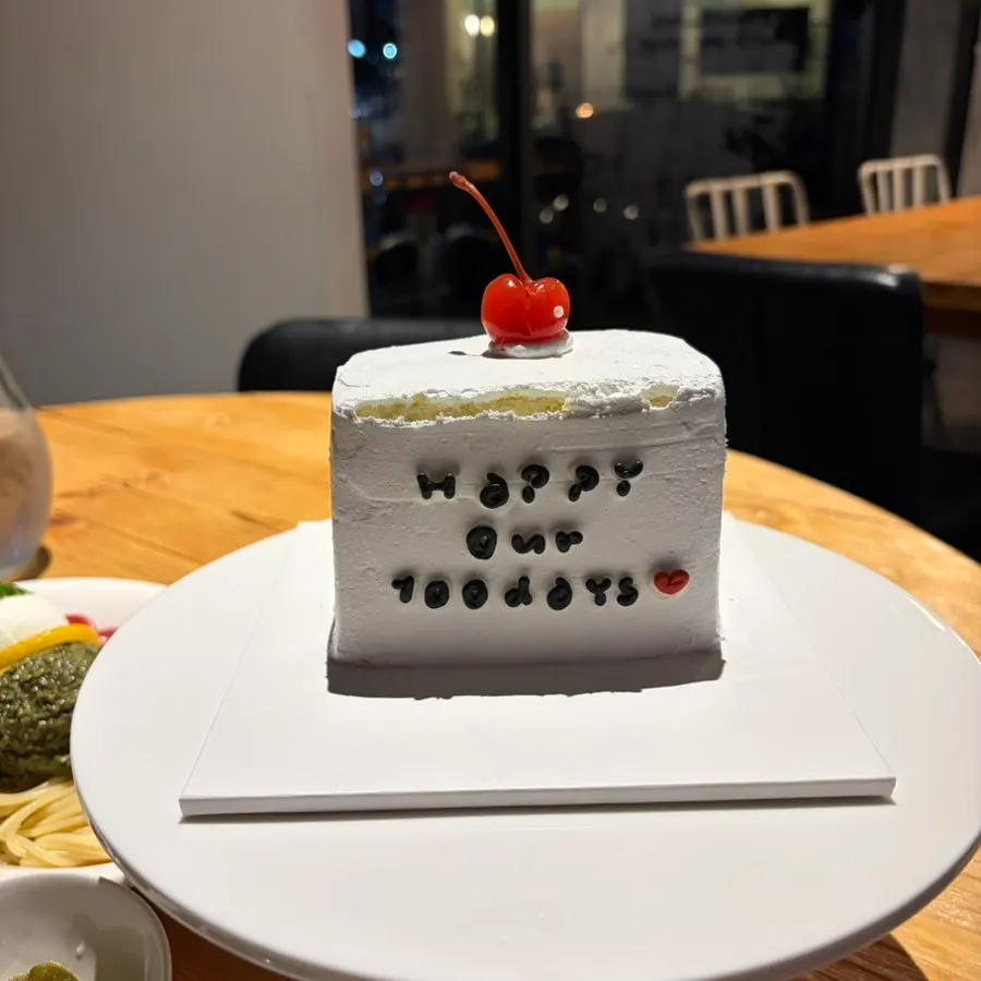 Anniversary cake on the plate the owner brought out