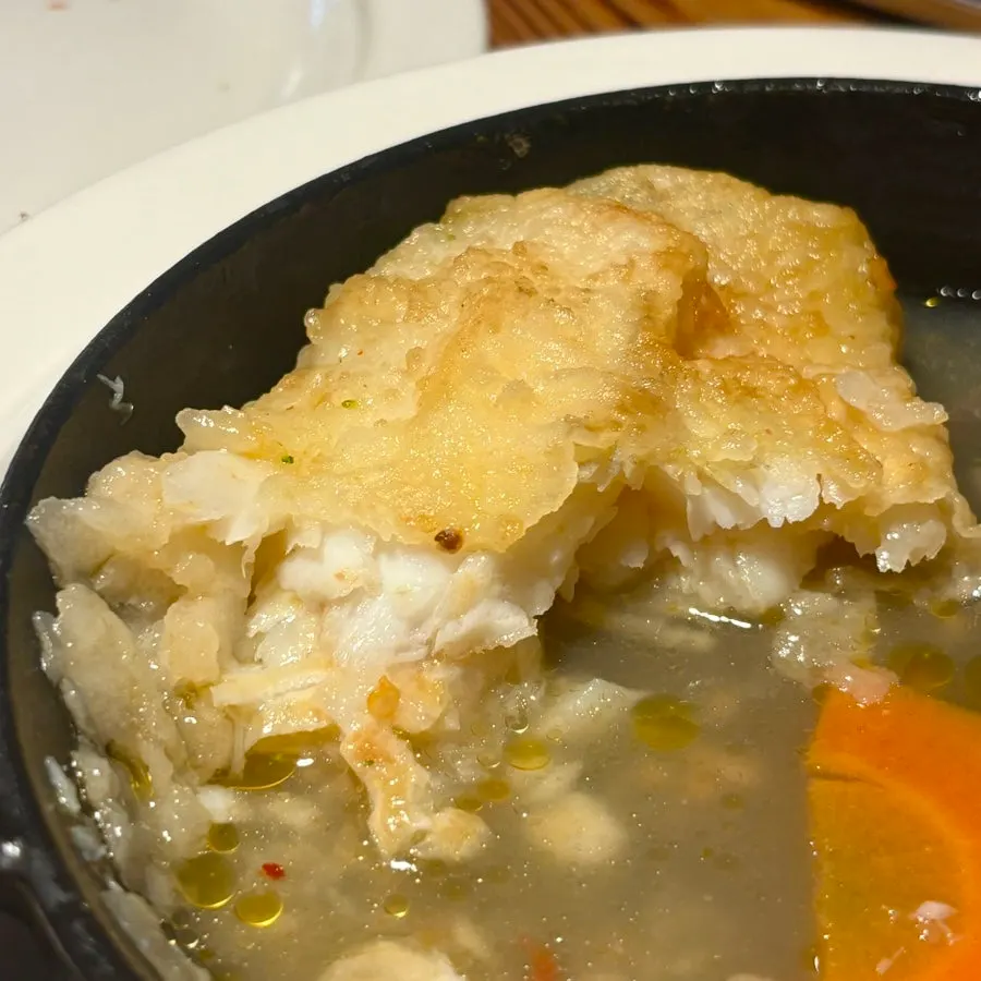 Flounder with clam and vegetable sauce