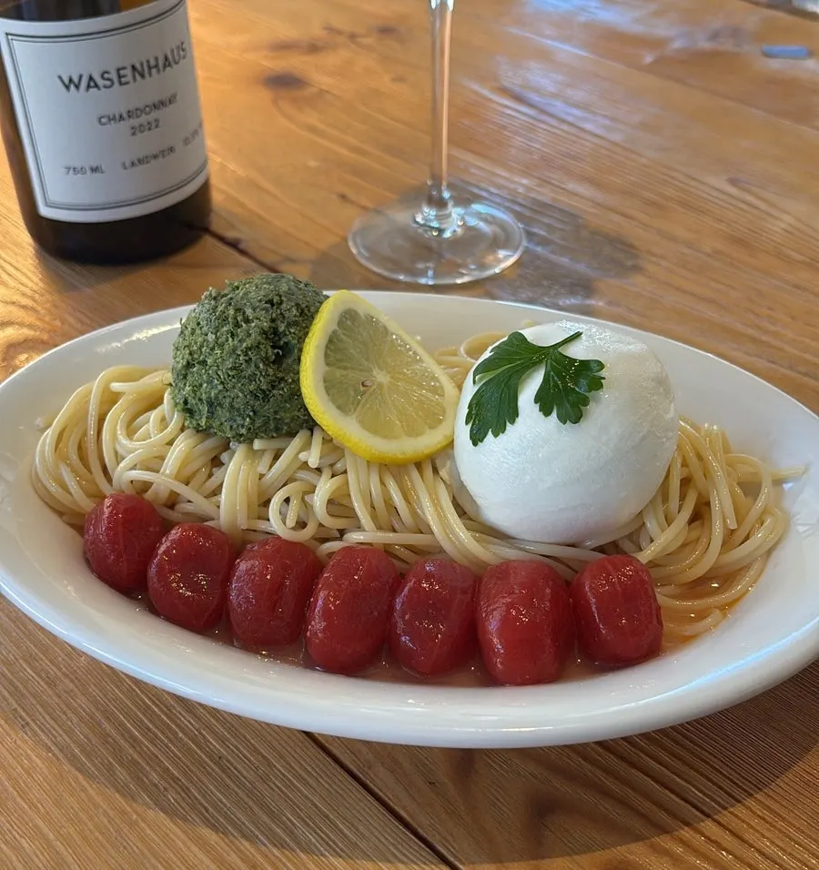 Basil cold pasta topped with burrata