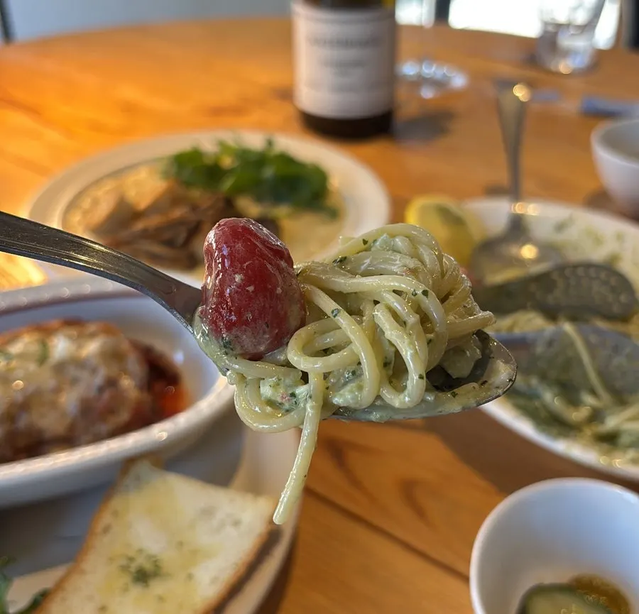 Cold pasta mixed with burrata