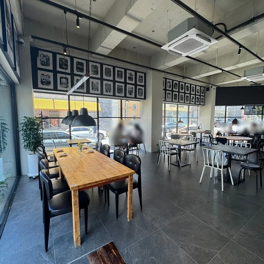 Restaurant wall with black-and-white photographs