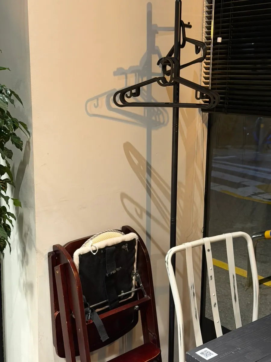 Coat hangers and baby chairs at Andover