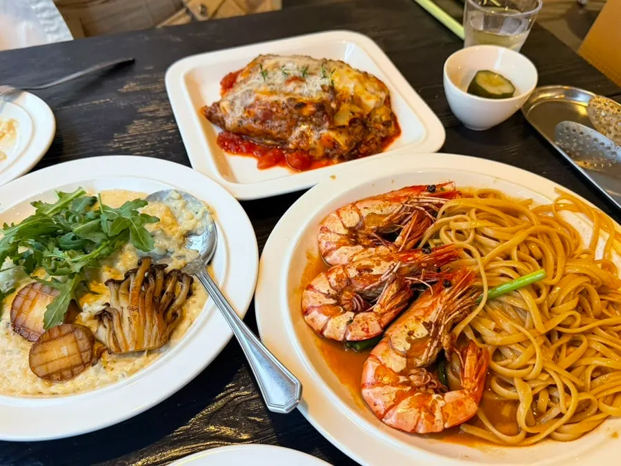 Pasta and risotto placed on Andover's table